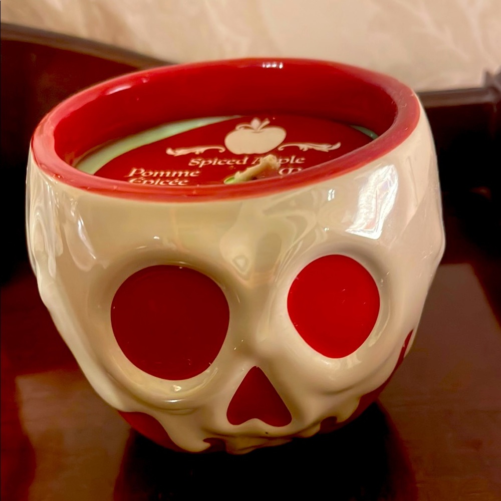 Vibrant Red Skull Candle Holder with Eye-Catching Accents- poison apple Disney
